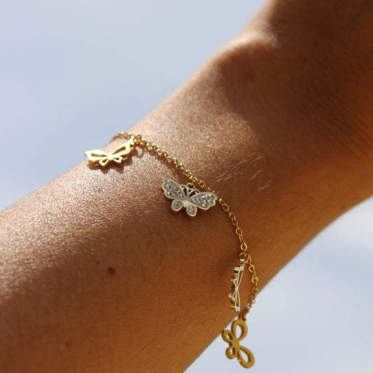 Le Bracelet avec des papillons Doré